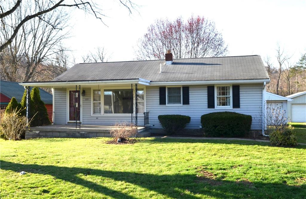 123 Jackson Street Harmony, PA 16037 - Photo 1 of 10 a front view of house with yard space and seating area