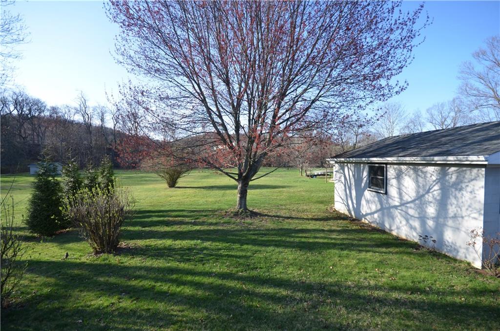 123 Jackson Street Harmony, PA 16037 - Photo 5 of 10 a view of a park with a large tree