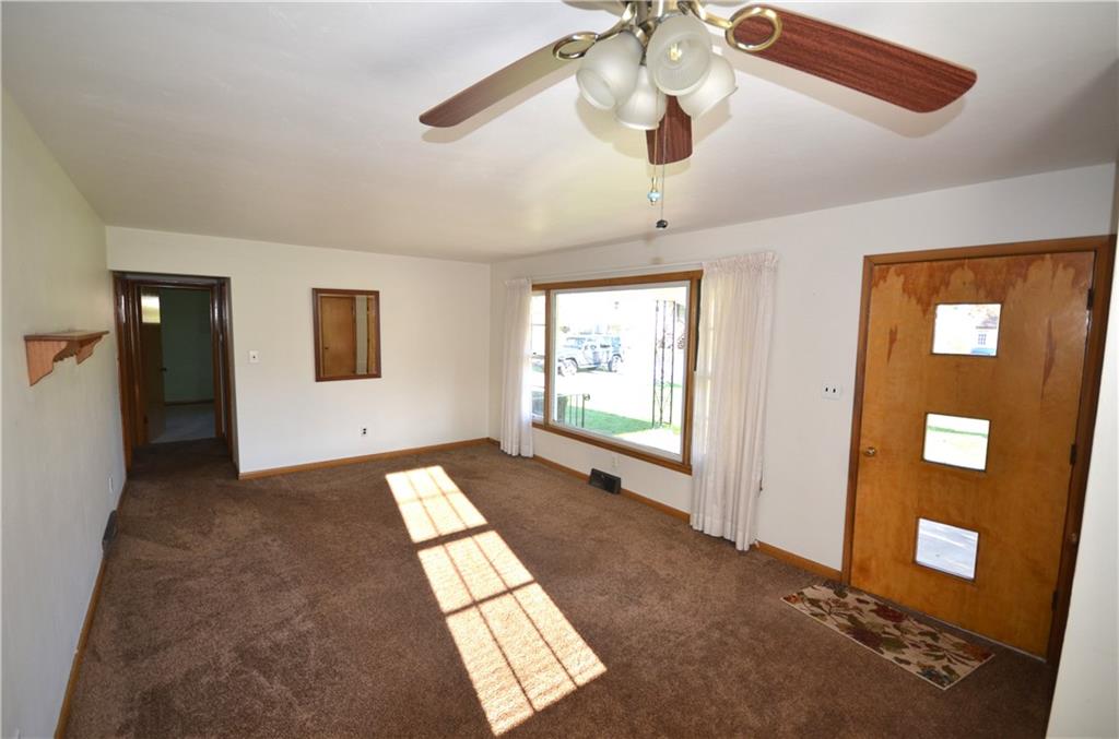 123 Jackson Street Harmony, PA 16037 - Photo 6 of 10 a view of an empty room with a window