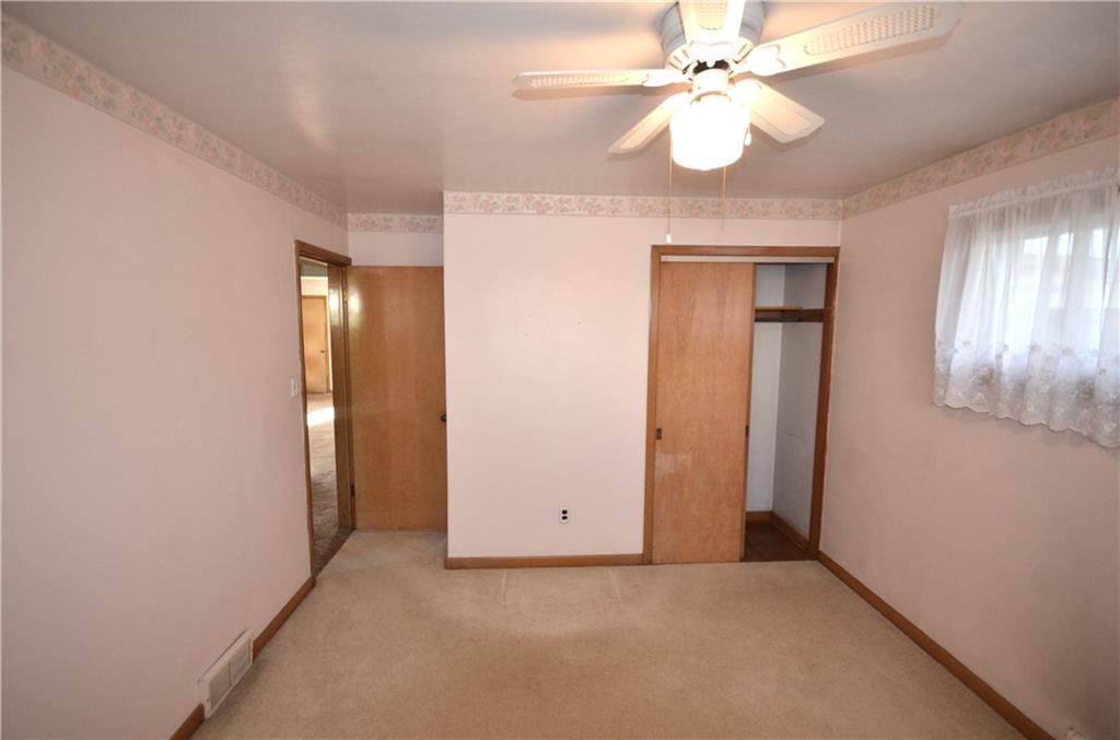 123 Jackson Street Harmony, PA 16037 - Photo 7 of 10 wooden floor in an empty room with a window