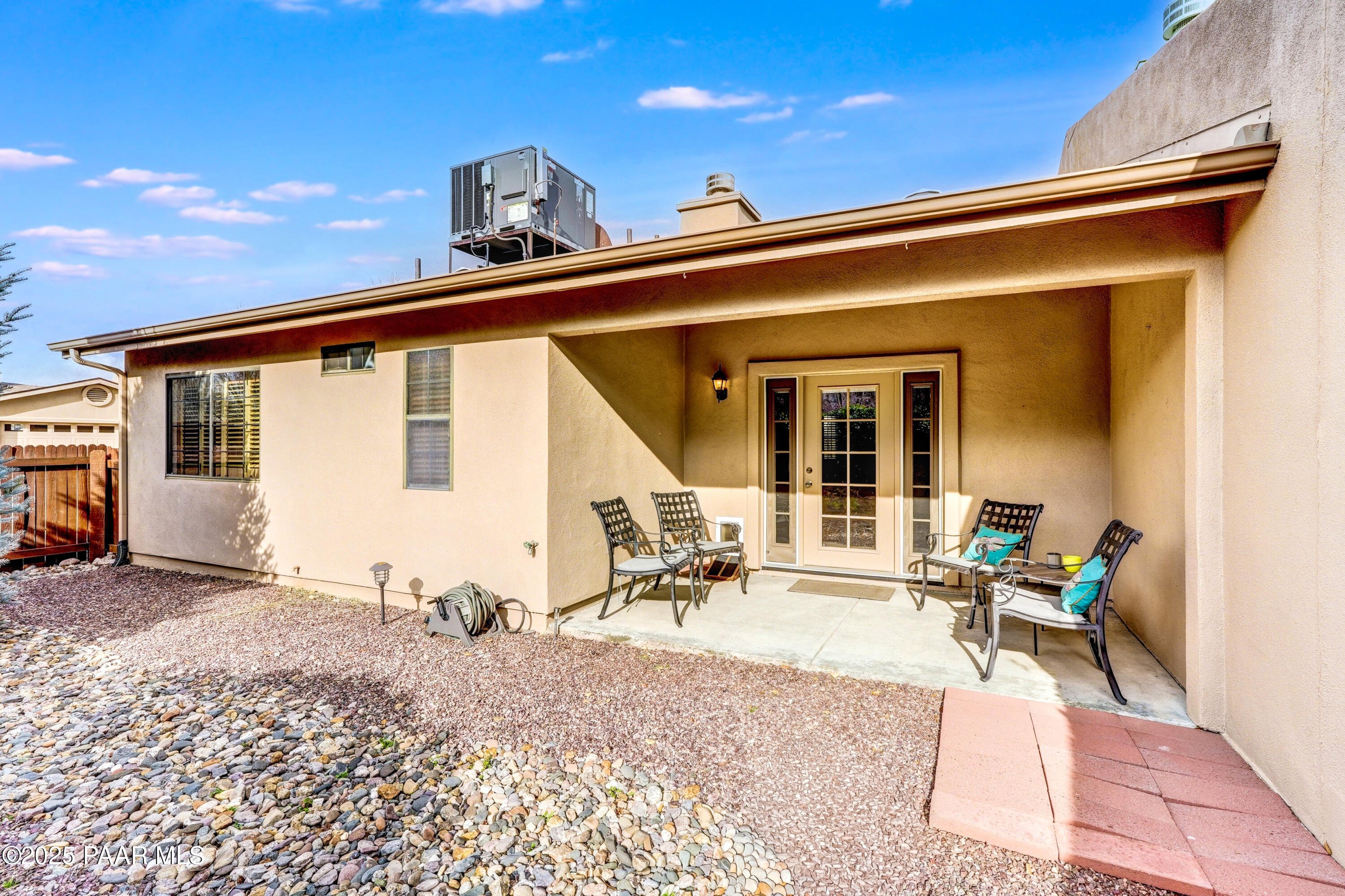3315 Iris Lane Prescott, AZ 86305 - Photo 20 of 26 a front view of a house with outdoor seating