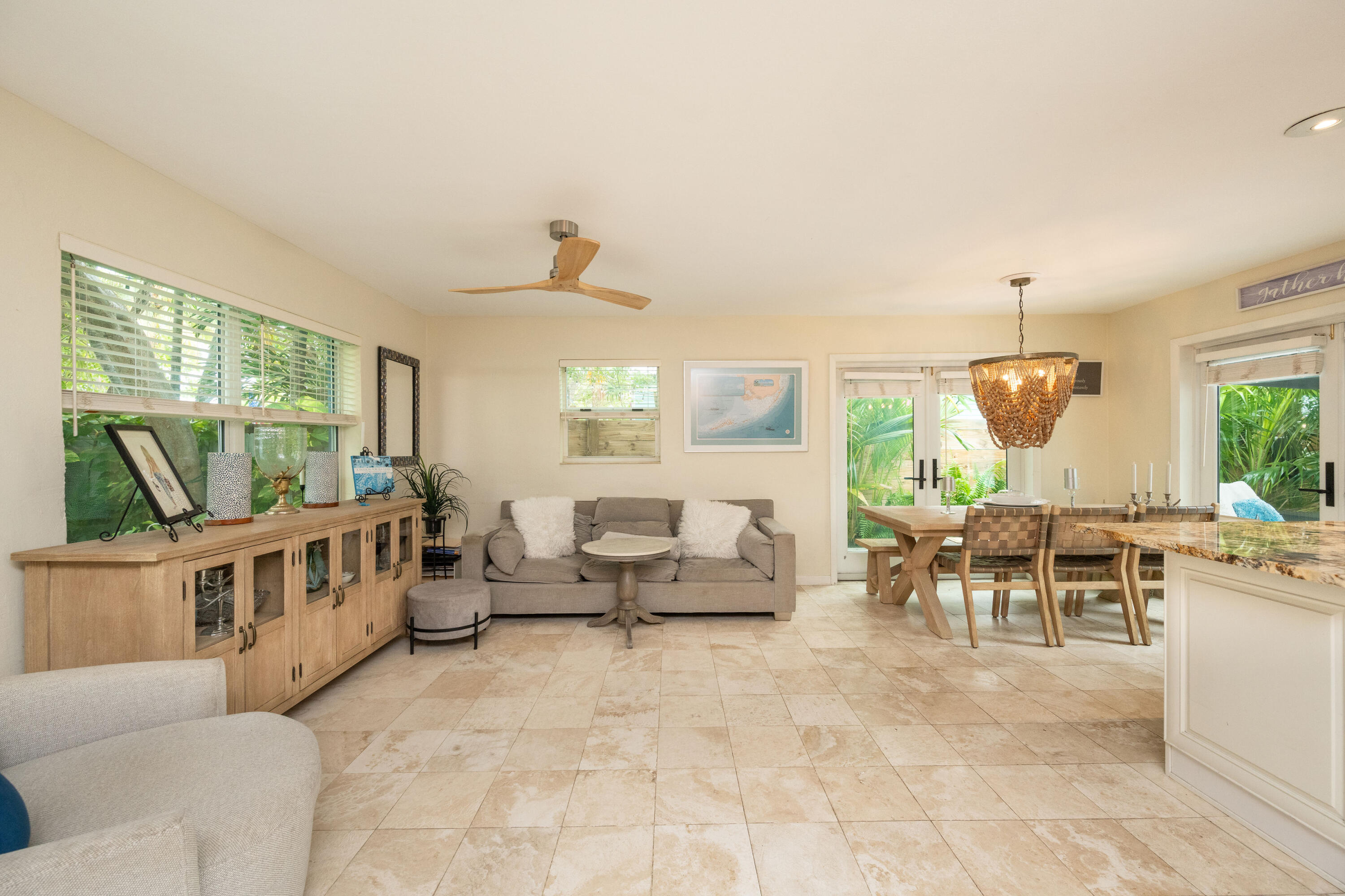 1523 Seminary Street Key West, FL 33040 - Photo 6 of 38 a living room with furniture and a large window