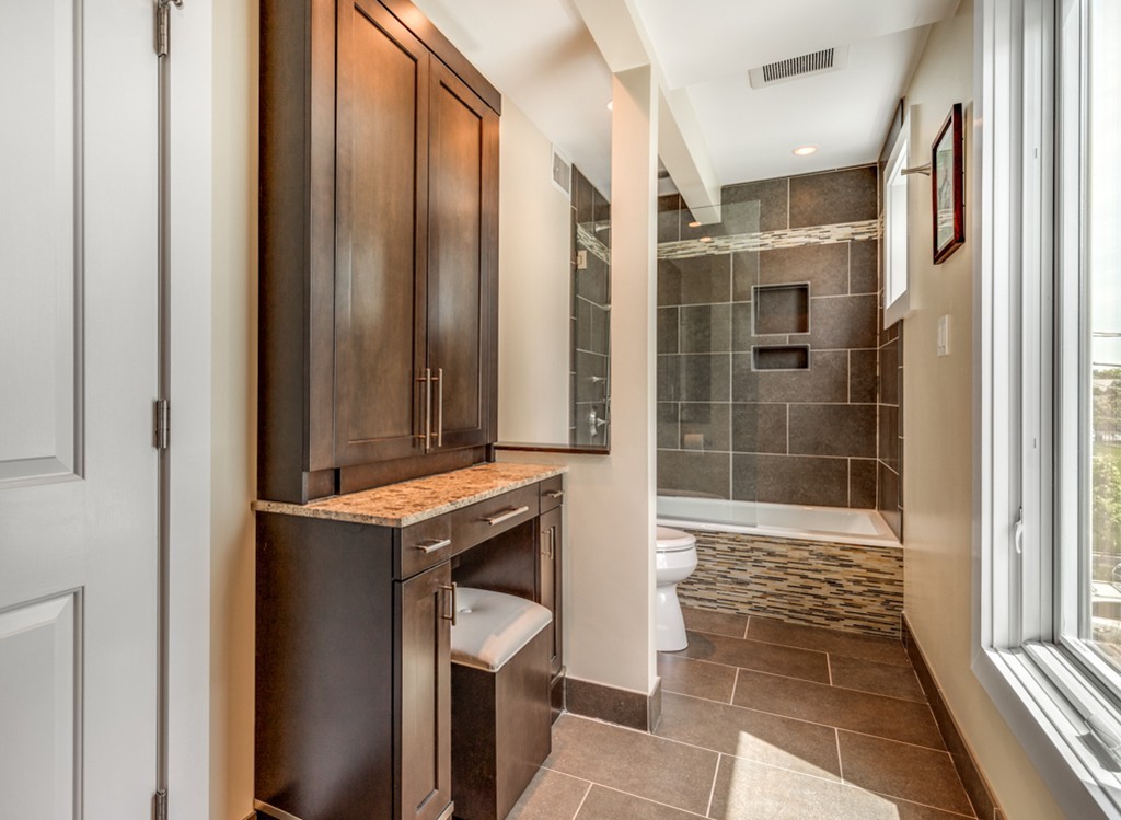 35 Perry Street, Unit 35 Somerville, MA 02143 - Photo 5 of 9 a bathroom with a shower and a sink