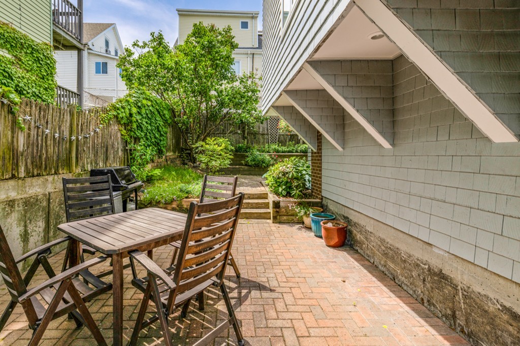 35 Perry Street, Unit 35 Somerville, MA 02143 - Photo 8 of 9 a view of chair and tables