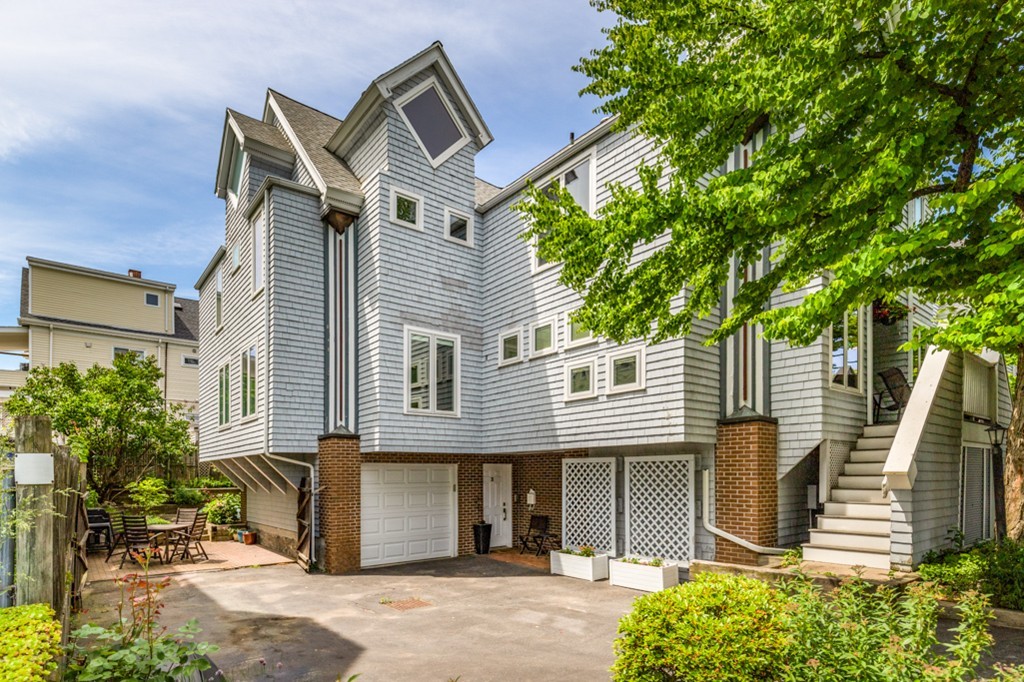 35 Perry Street, Unit 35 Somerville, MA 02143 - Photo 9 of 9 a front view of a house with a garden
