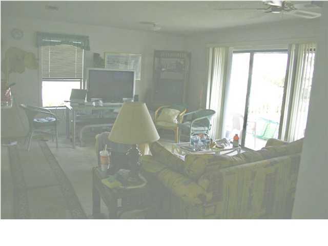 3799 Hwy Santa Rosa Beach, Unit 14H 30A Santa Rosa Beach, FL 32459 - Photo 5 of 7 a view of a dining room with a table and chair