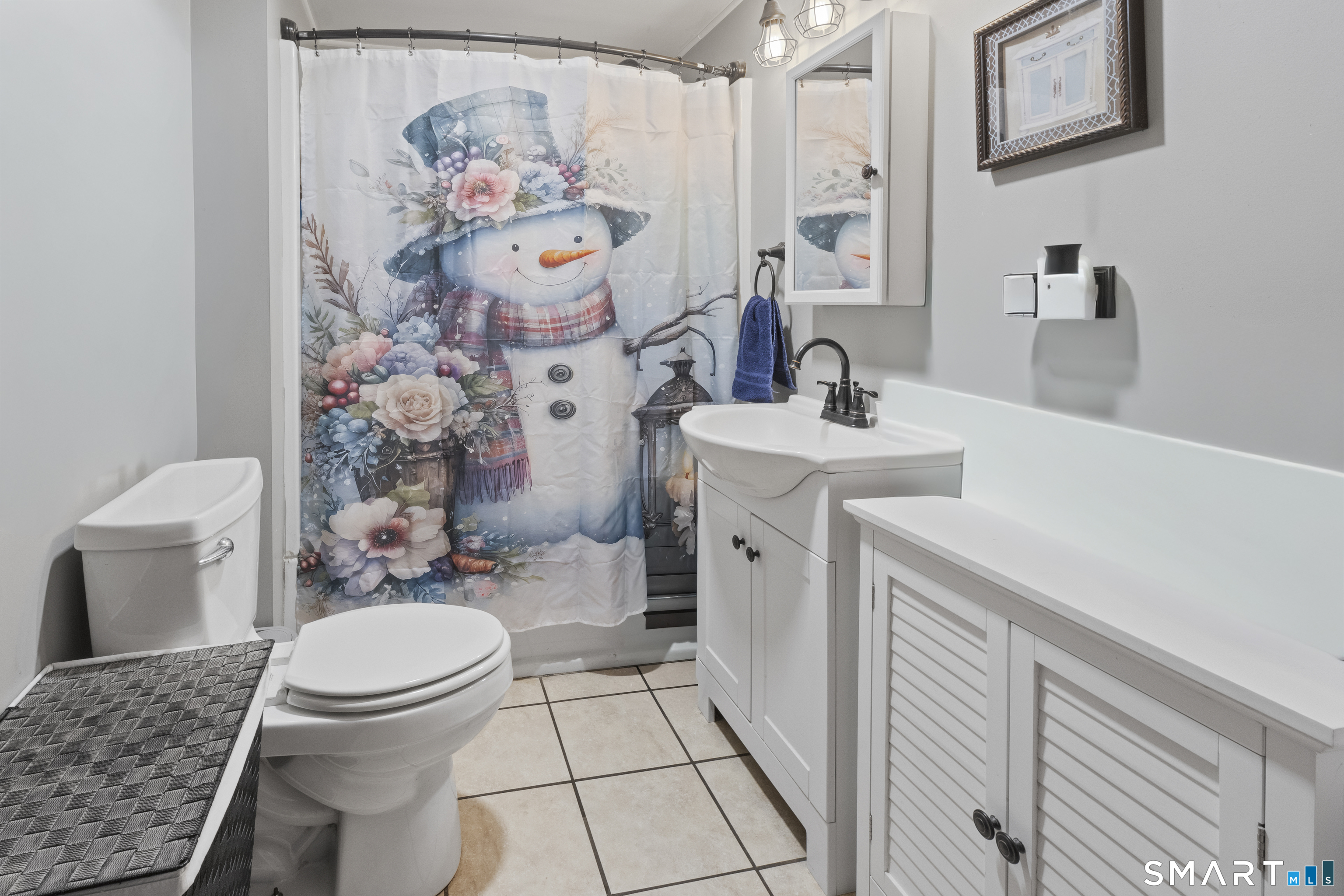 17 Auburn Street Putnam, CT 06260 - Photo 9 of 9 a bathroom with a sink toilet and shower