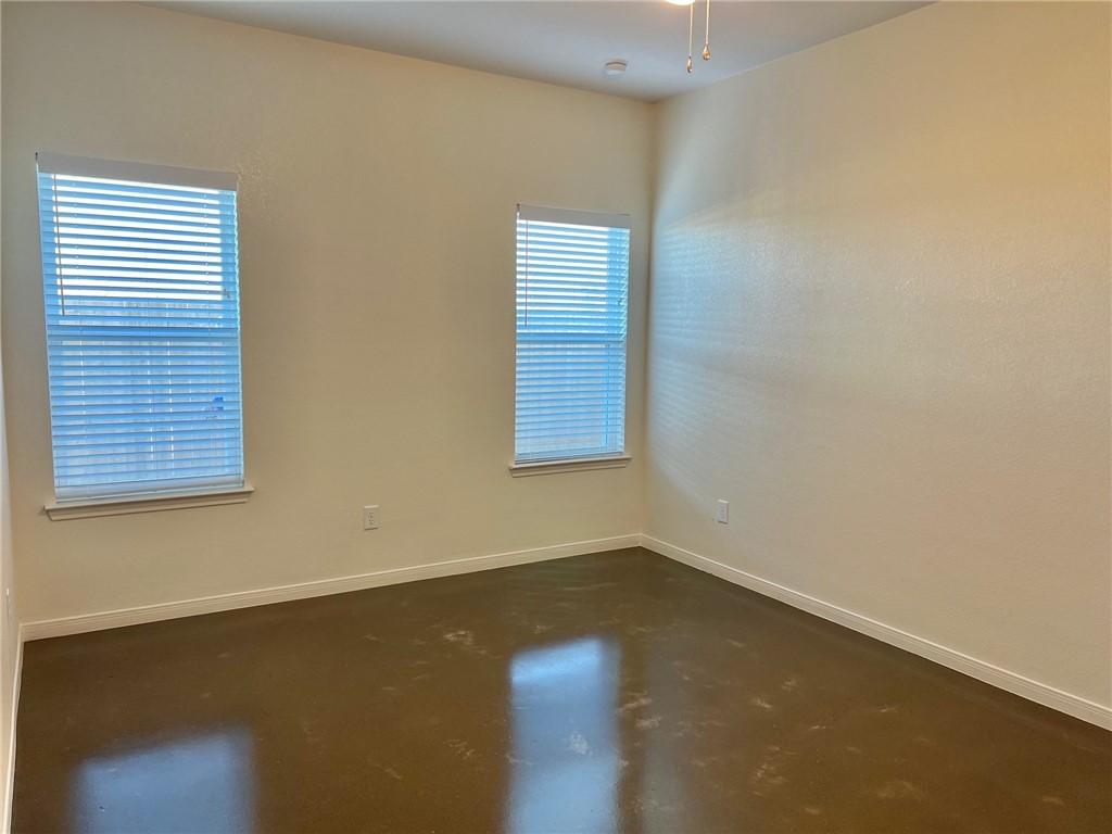 705 Tower Mill Robinson, TX 76706 - Photo 8 of 15 an empty room with a window