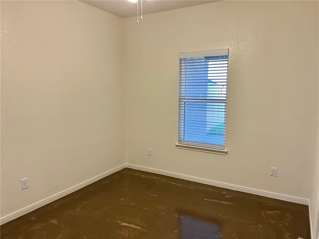 705 Tower Mill Robinson, TX 76706 - Photo 9 of 15 an empty room with a window