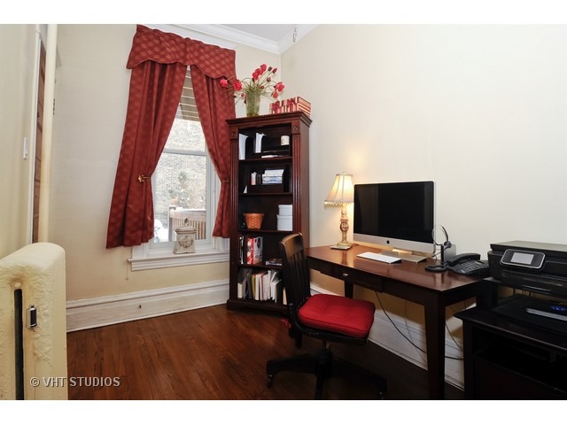 2157 North Seminary Avenue, Unit A Chicago, IL 60614 - Photo 12 of 15 a view of a workspace with furniture and a window