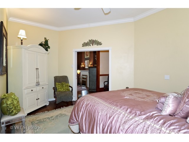 2157 North Seminary Avenue, Unit A Chicago, IL 60614 - Photo 10 of 15 a bedroom with a bed and a closet