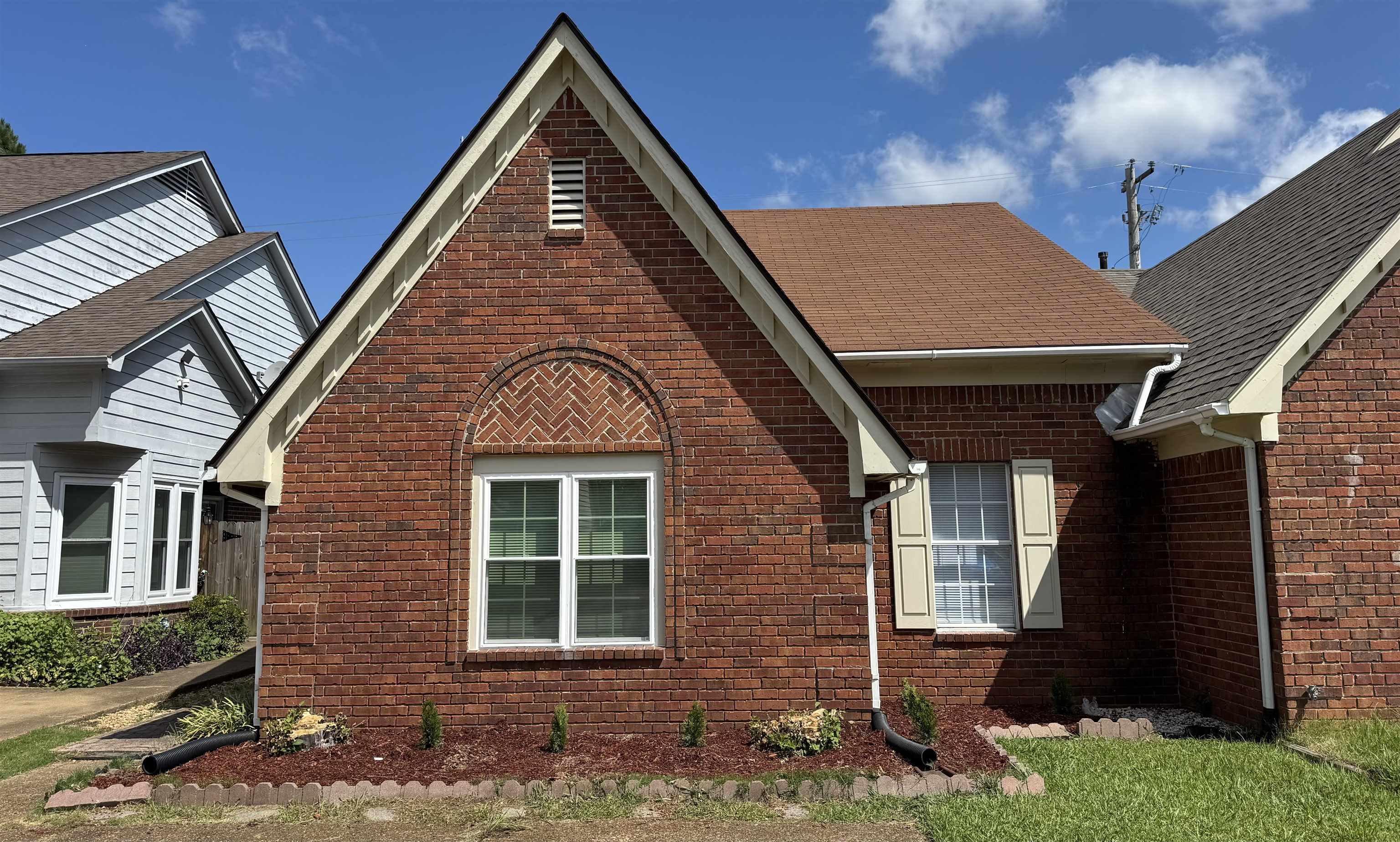 6932 Snyder Road Memphis, TN 38141 - Photo 1 of 15 front view of a house with a yard