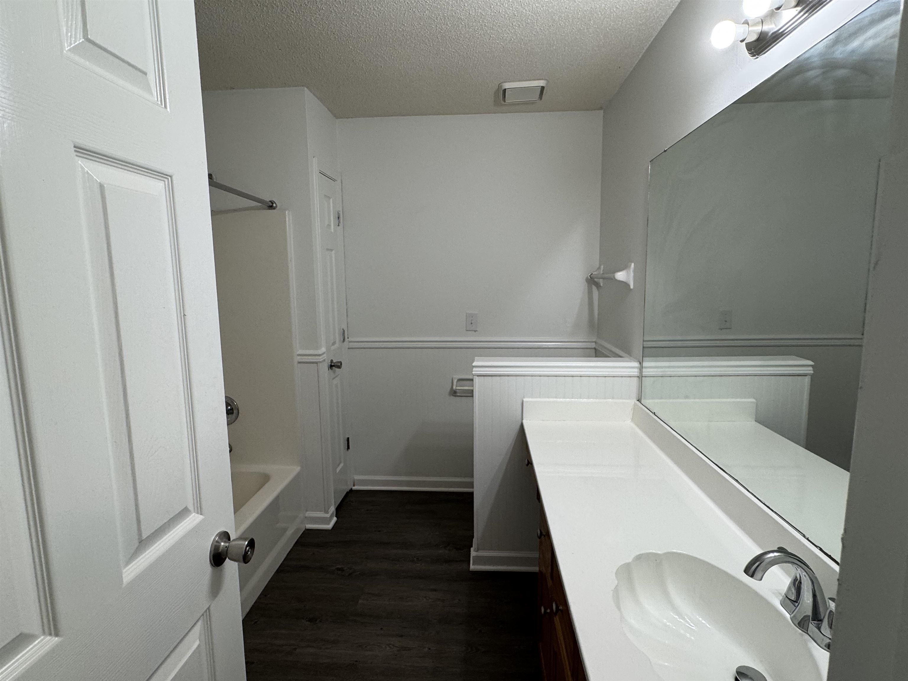 6932 Snyder Road Memphis, TN 38141 - Photo 14 of 15 a bathroom with a sink and mirror