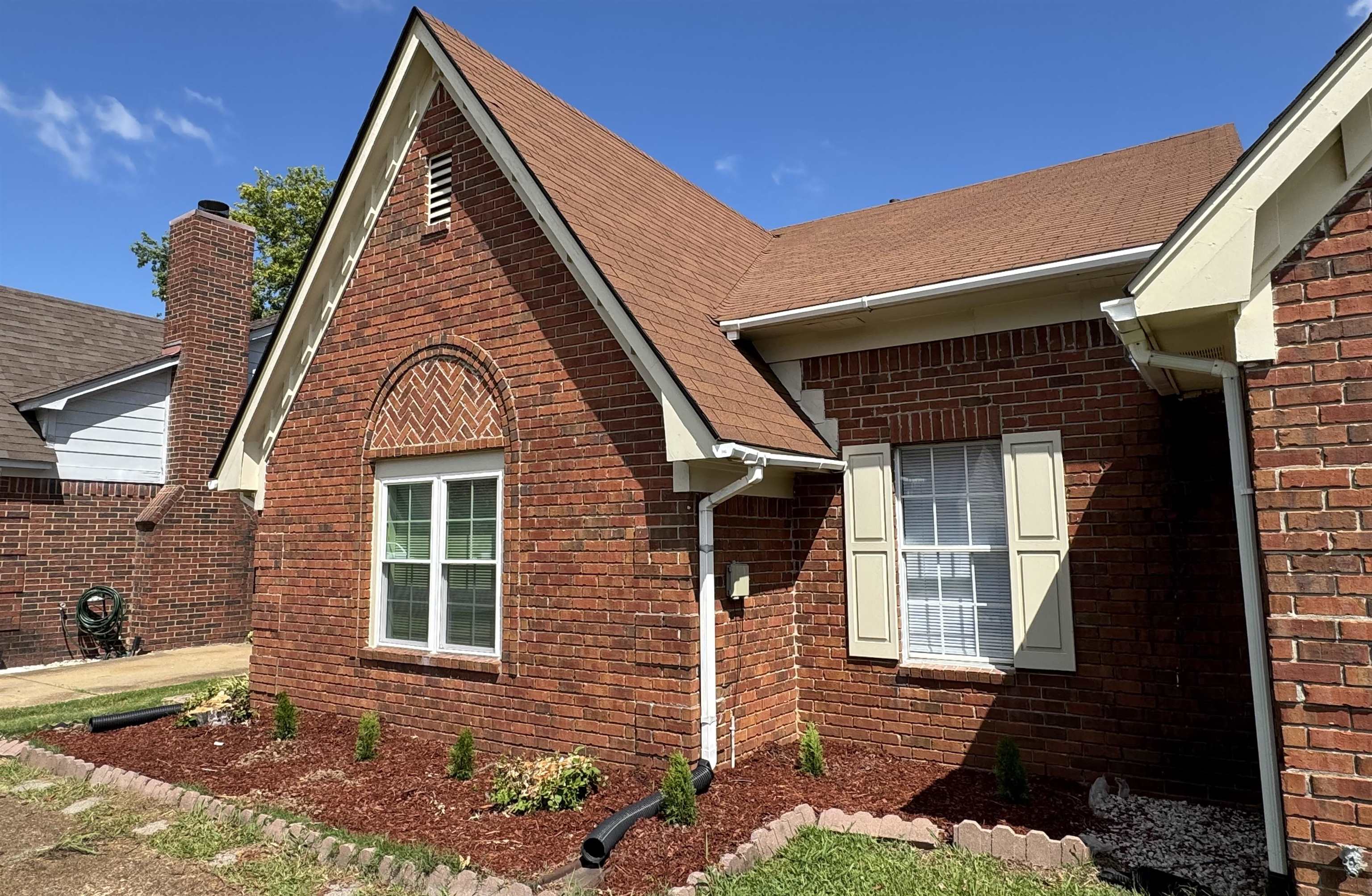6932 Snyder Road Memphis, TN 38141 - Photo 2 of 15 a view of a house with a yard