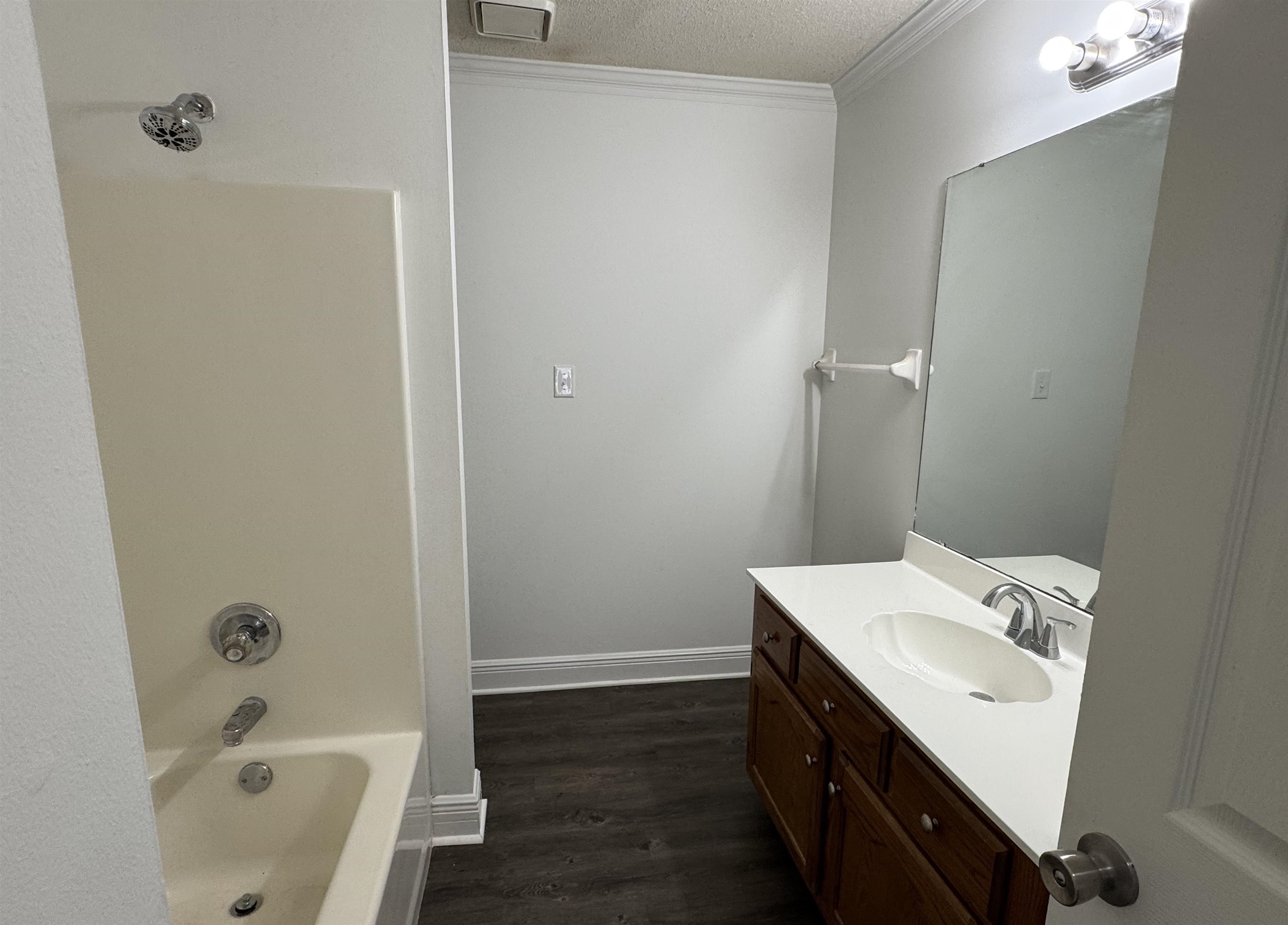 6932 Snyder Road Memphis, TN 38141 - Photo 9 of 15 a bathroom with a sink toilet and tub