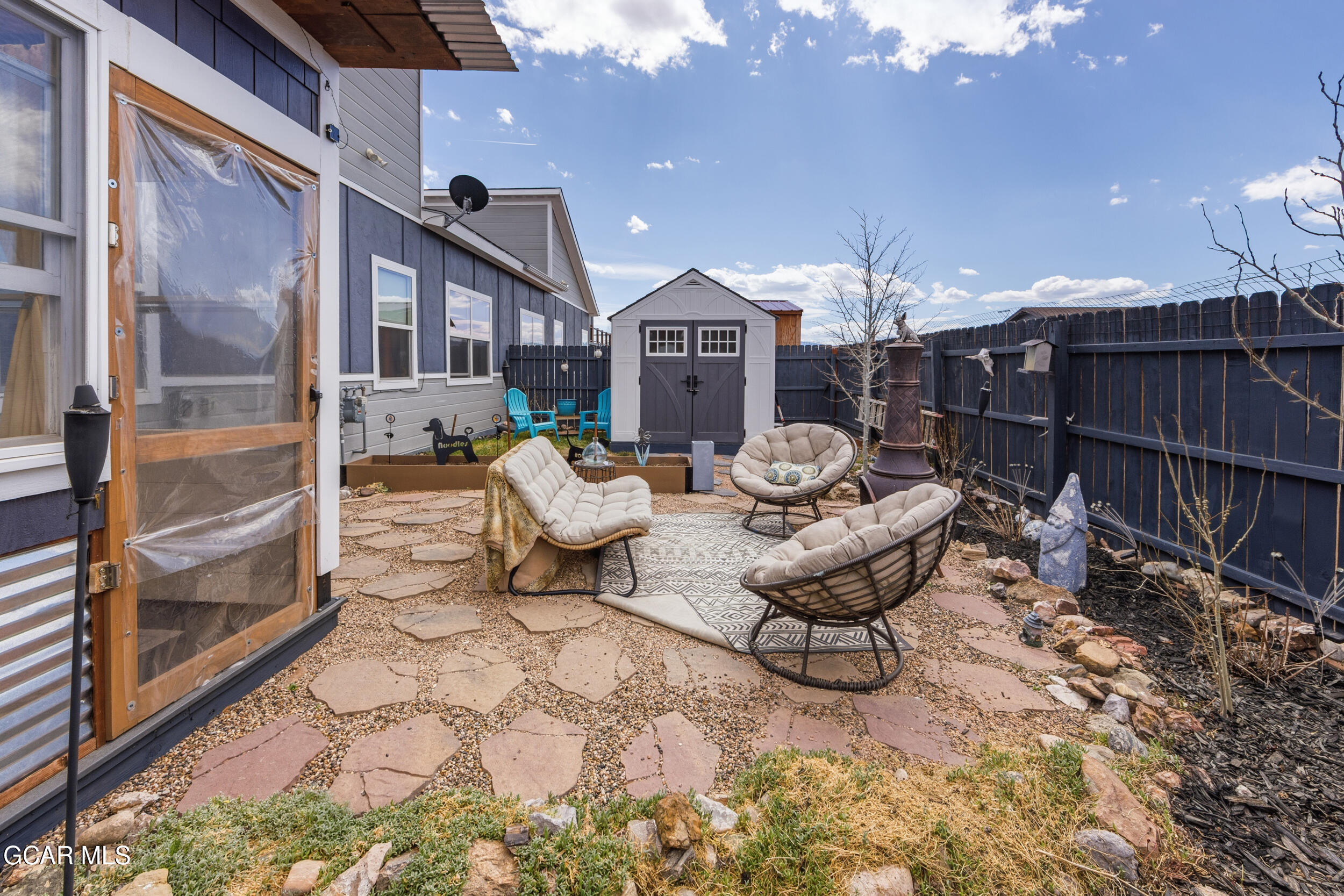 503 12th Street, Unit B Kremmling, CO 80459 - Photo 29 of 44 a building outdoor space with patio furniture and potted plants