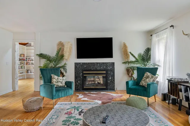 a kitchen with a stove a sink and a refrigerator