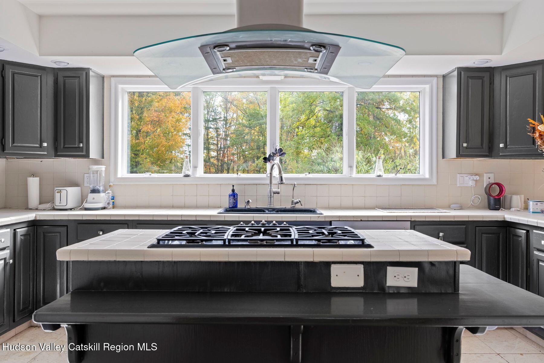 2935 Rte 44 55 Gardiner, NY 12525 - Photo 26 of 87 a kitchen with a stove a sink and a window