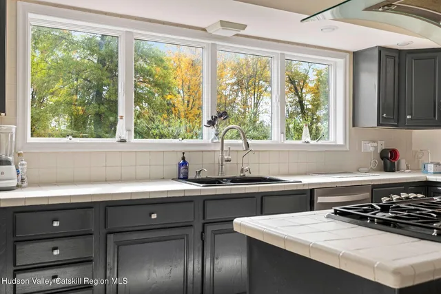 a view of a hallway with windows
