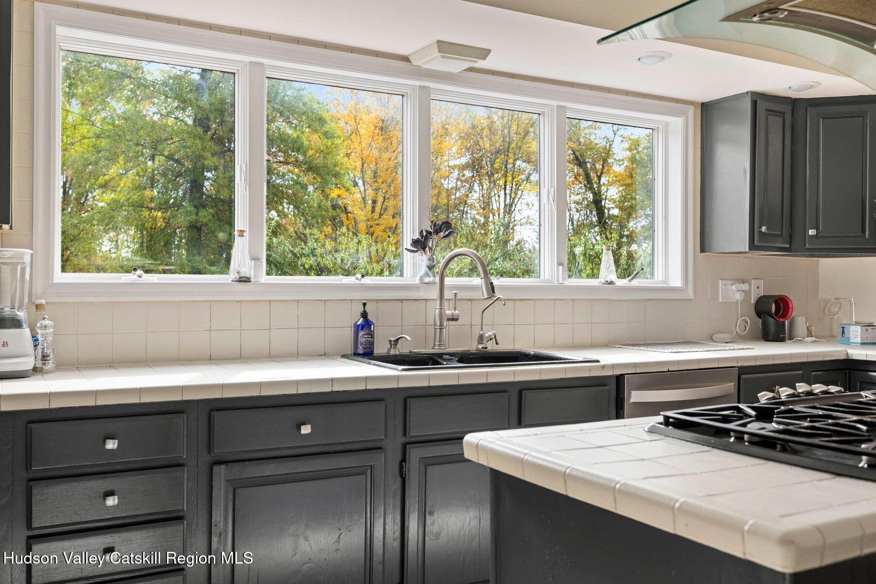 2935 Rte 44 55 Gardiner, NY 12525 - Photo 27 of 87 a kitchen with a sink a window and cabinets