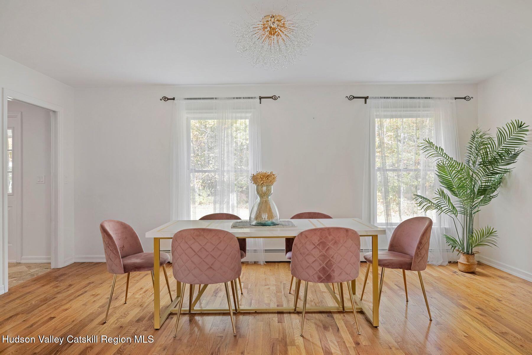 2935 Rte 44 55 Gardiner, NY 12525 - Photo 30 of 87 a view of a dining room with furniture and wooden floor