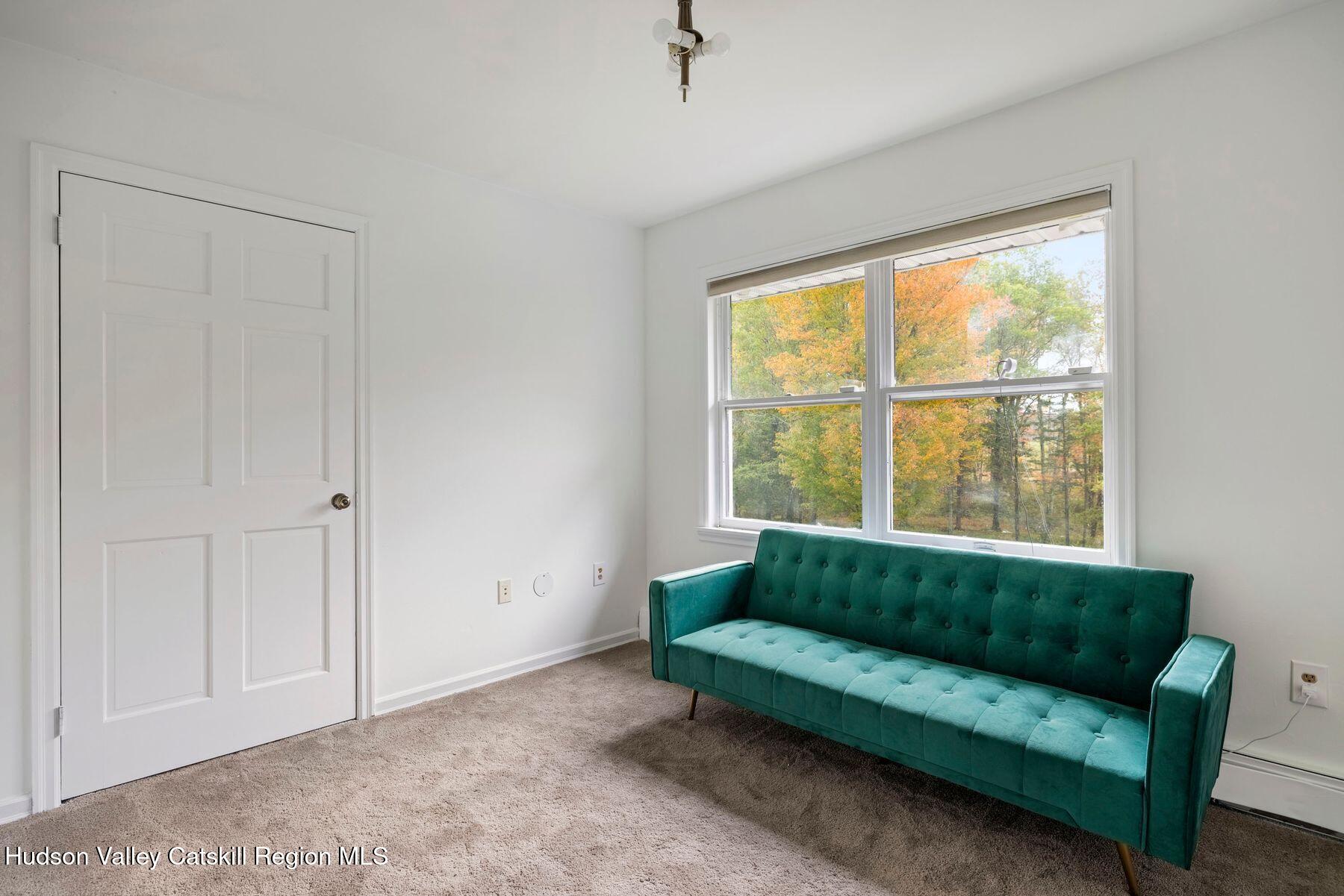 2935 Rte 44 55 Gardiner, NY 12525 - Photo 54 of 87 a living room with furniture and a window