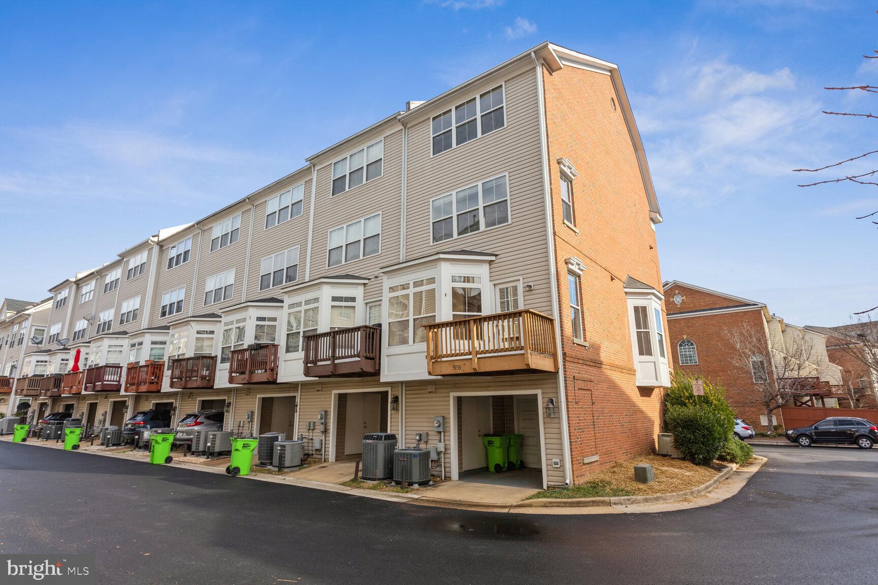 5133 Gardner Drive Alexandria, VA 22304 - Photo 20 of 25 a front view of a building with street
