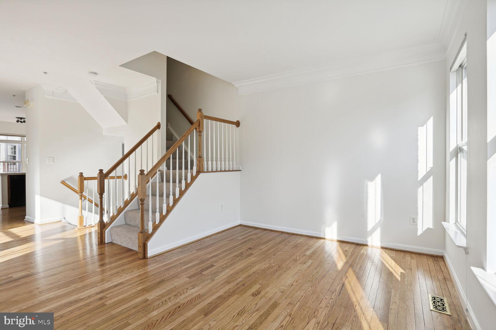 5133 Gardner Drive Alexandria, VA 22304 - Photo 6 of 25 a view of an entryway with wooden floor