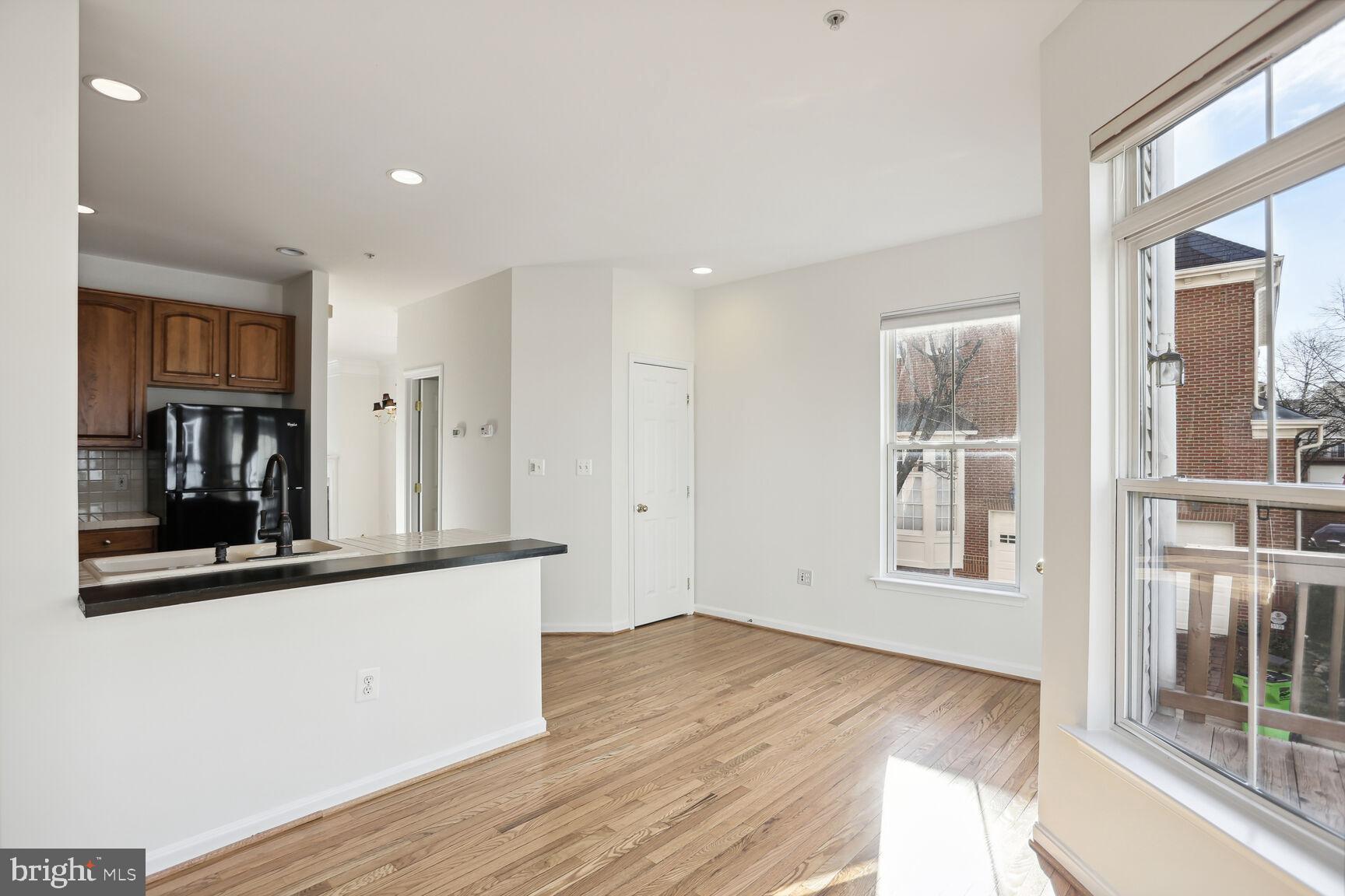 5133 Gardner Drive Alexandria, VA 22304 - Photo 10 of 25 a view of a room with wooden floor and a window