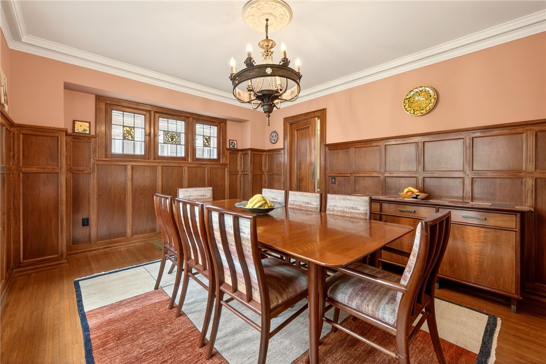 391 Beresford Road Rochester, NY 14610 - Photo 16 of 44 Natural walnut raised panel walls and leaded glass