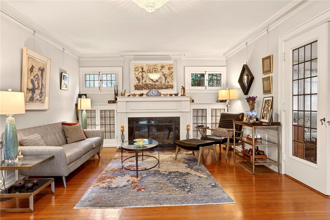391 Beresford Road Rochester, NY 14610 - Photo 19 of 44 Gas FP with marble surround framed by gorgeous lea