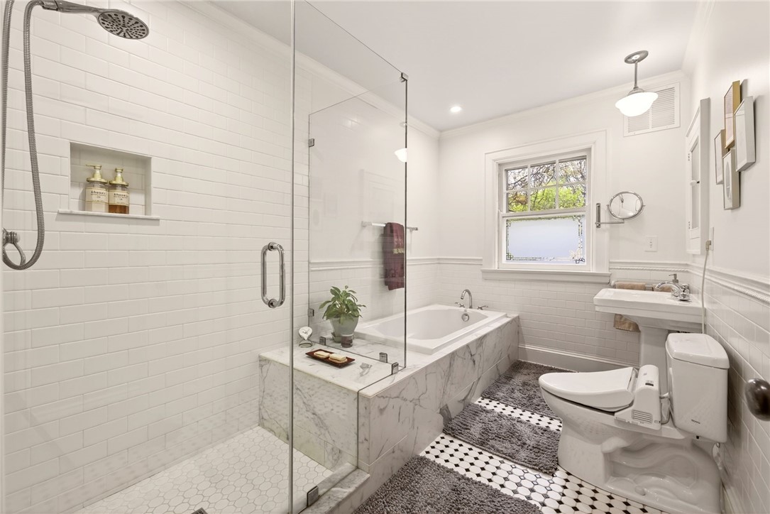 391 Beresford Road Rochester, NY 14610 - Photo 29 of 44 Updated bath with soak tub and large shower
