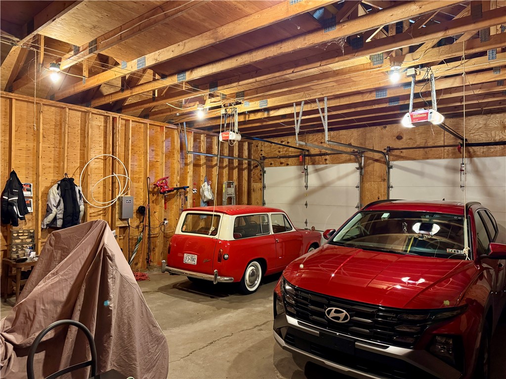 391 Beresford Road Rochester, NY 14610 - Photo 37 of 44 HUGE 2 1/2+ garage with storage loft