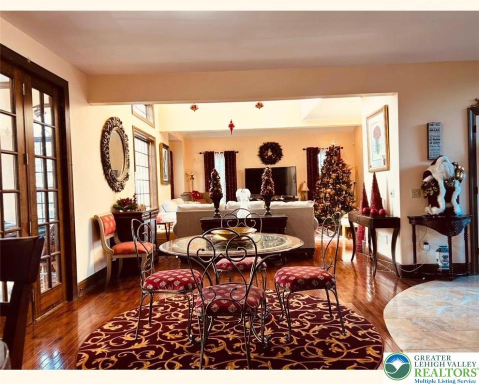459 Mt Pleasant Road Bangor, PA 18013 - Photo 18 of 86 a living room with lots of furniture a rug and a large window