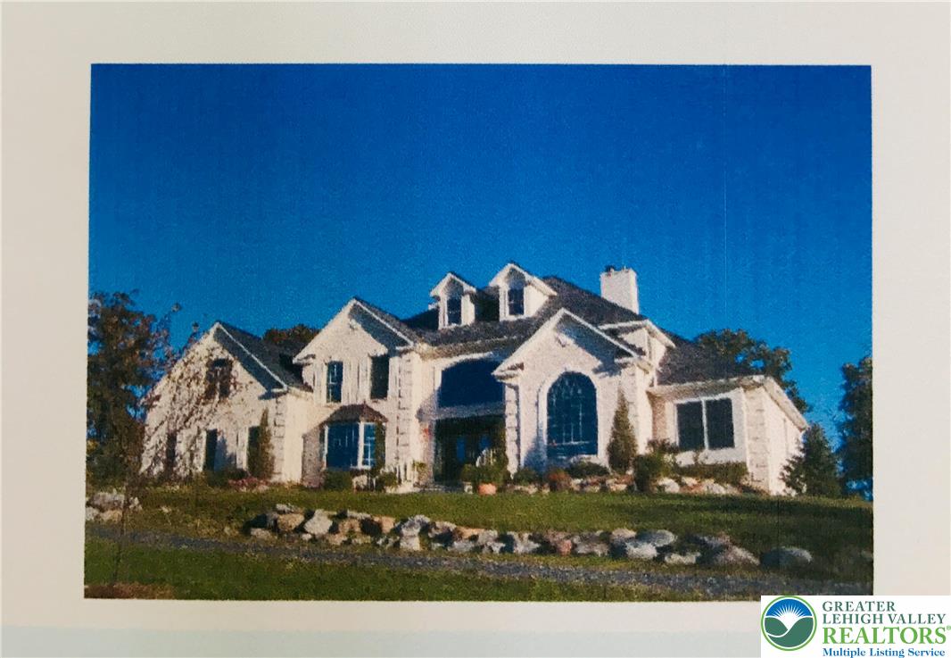 459 Mt Pleasant Road Bangor, PA 18013 - Photo 2 of 86 a front view of a house with a yard