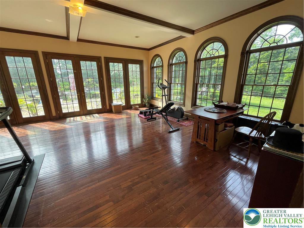 459 Mt Pleasant Road Bangor, PA 18013 - Photo 44 of 86 a living room with furniture and floor to ceiling windows