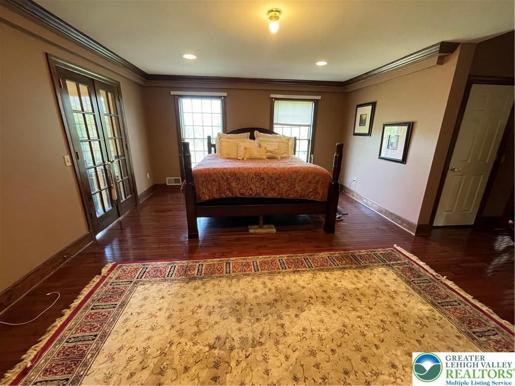 459 Mt Pleasant Road Bangor, PA 18013 - Photo 52 of 86 a bedroom with furniture window and wooden floor