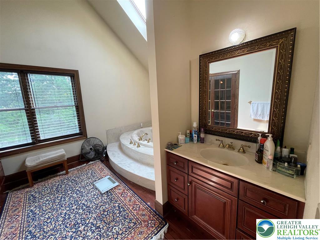 459 Mt Pleasant Road Bangor, PA 18013 - Photo 58 of 86 a bathroom with a sink and a mirror