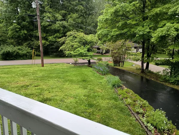 a view of a lake with a yard
