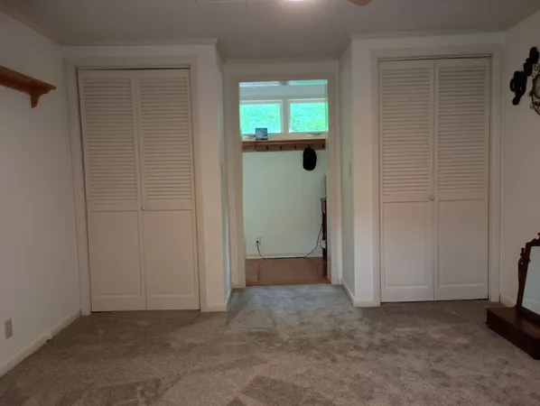 an empty room with windows