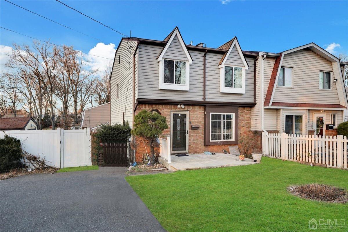 145 Jefferson Boulevard Edison, NJ 08817 - Photo 1 of 35 a front view of a house with a yard