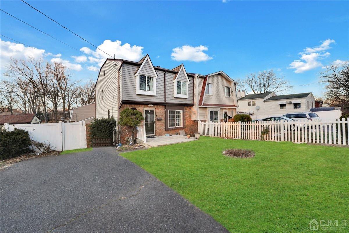 145 Jefferson Boulevard Edison, NJ 08817 - Photo 3 of 35 a view of a house with a yard and deck