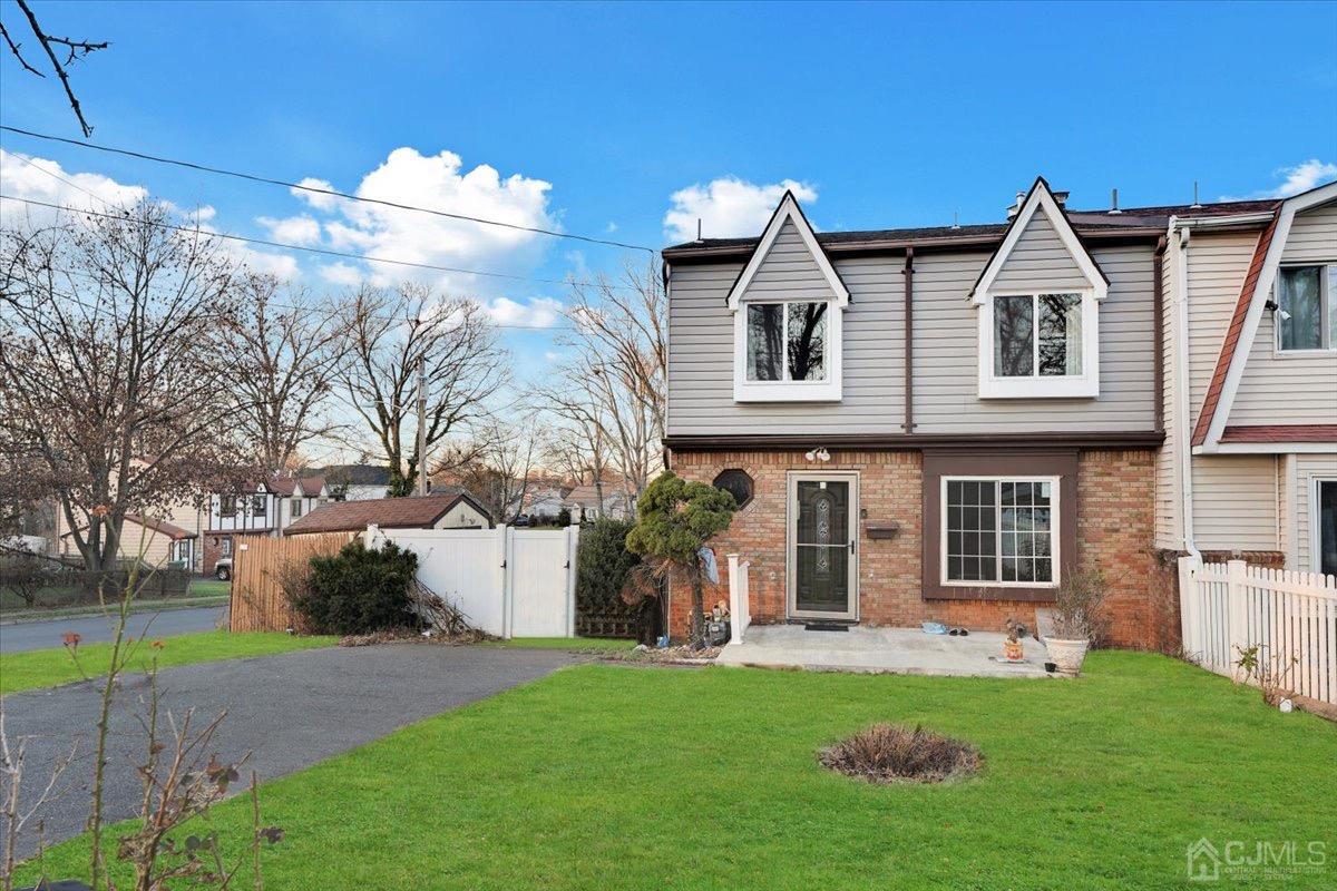145 Jefferson Boulevard Edison, NJ 08817 - Photo 34 of 35 a front view of a house with a yard and garage