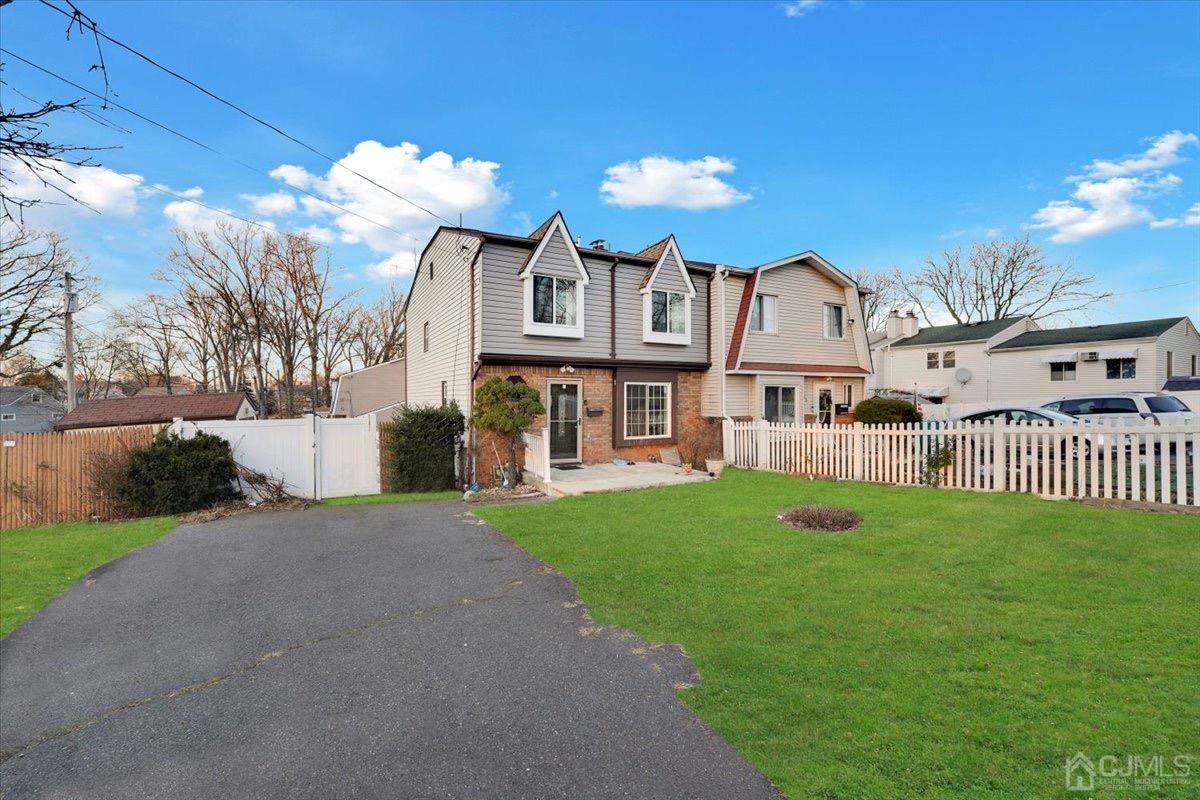 145 Jefferson Boulevard Edison, NJ 08817 - Photo 35 of 35 a front view of a house with a yard