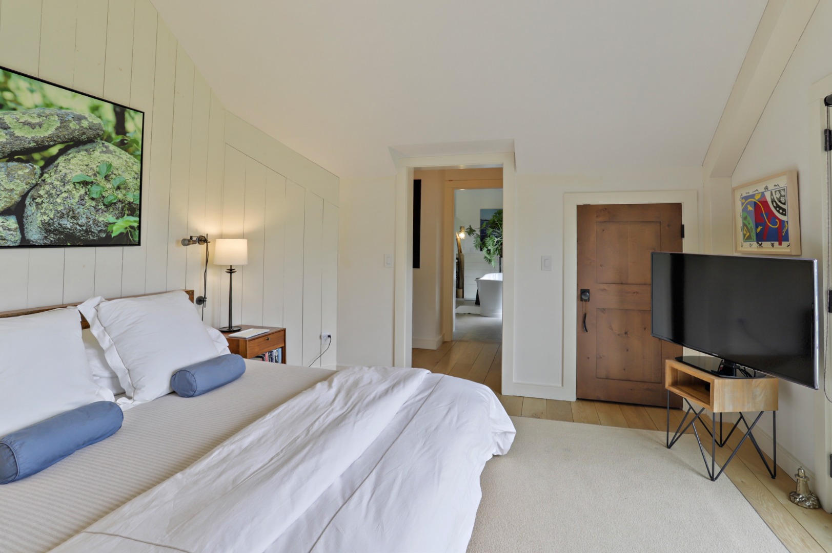 9 Ridge Hill Road Chilmark, MA 02535 - Photo 27 of 48 a bedroom with a bed and a flat screen tv