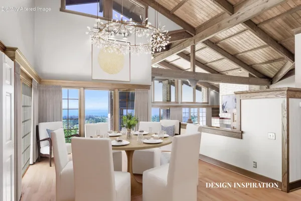 a dining room with furniture a chandelier and wooden floor