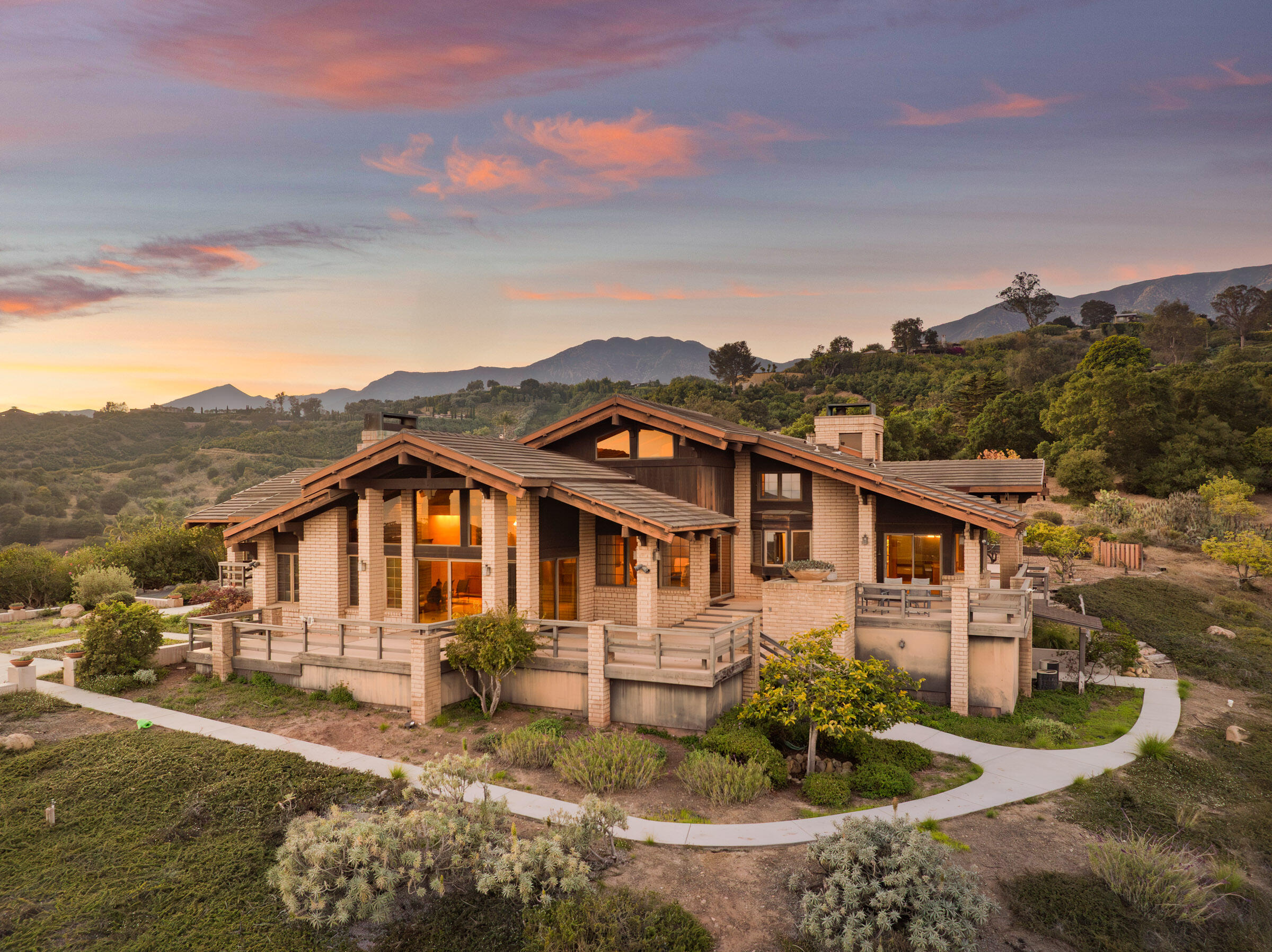450 Lambert Road Carpinteria, CA 93013 - Photo 5 of 21 a front view of a house with a yard