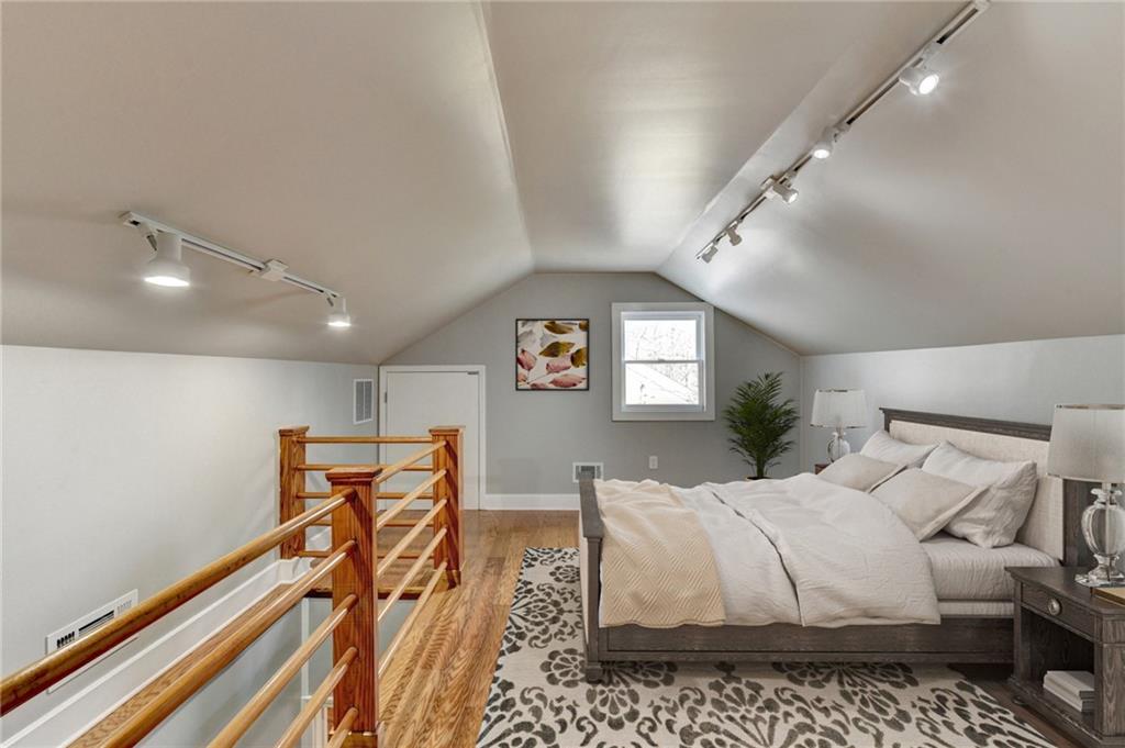 1926 North Decatur Road Atlanta, GA 30307 - Photo 16 of 40 a bedroom with a bed and window