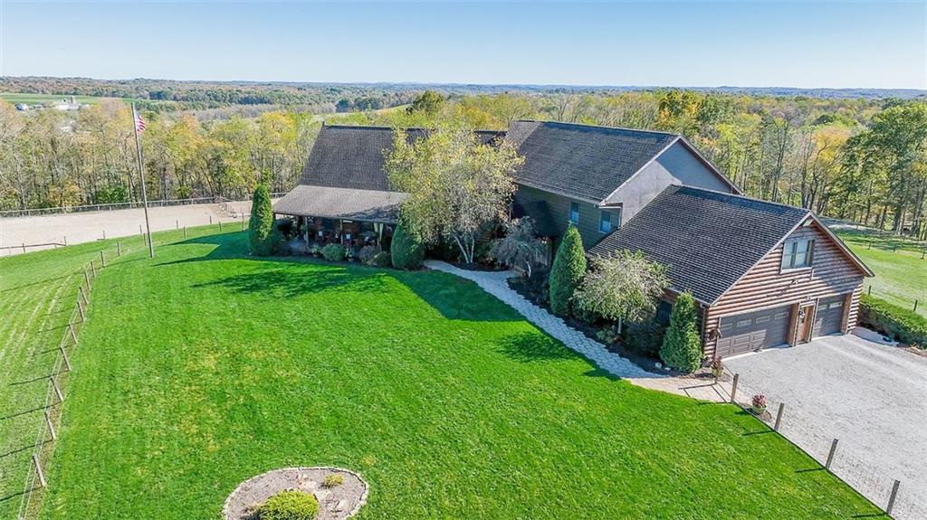 a view of a house with a garden