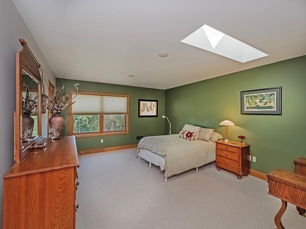 166 McKay Road Saxonburg, PA 16056 - Photo 27 of 47 a bedroom with a bed and wooden floor